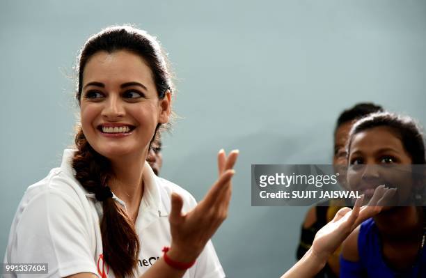Indian Bollywood actress Dia Mirza attends an event for the charity Save the Children in Mumbai on July 4, 2018.