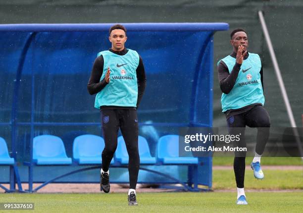 Trent Alexander-Arnold and Danny Welbeck warm up during an England training session on July 4, 2018 in Saint Petersburg, Russia.