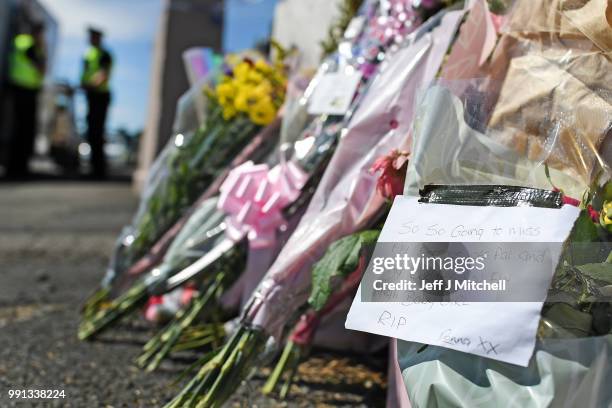 Trinutes are left at a house on Ardbeg Road on the Isle of Bute following the conformation that six year old schoolgirl Alesha MacPhail was murdered...