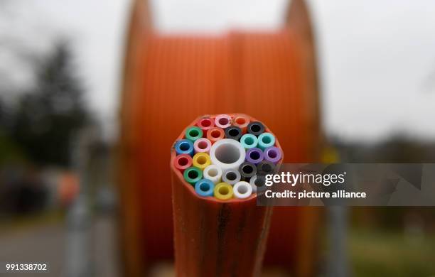 Cable drum with tubes for broadband cables stand on a construction site in Westerroenfeld, Germany, 9 November 2017. The government at that time...