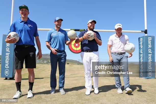 Players Kieran Donaghy of Kerry and Michael Murphy of Donegal pose for the camera with Golfer's Shane Lowry of Ireland and Paul Dunne of Ireland...