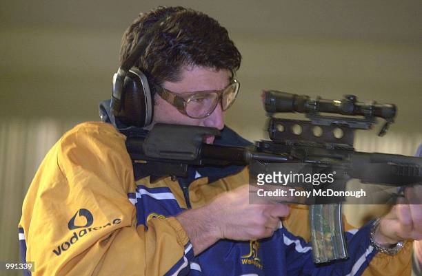 John Eales of The Wallabies fires a rifle during a training session with the SAS at Campbell Barracks in Perth, Australia. DIGITAL IMAGE Mandatory...