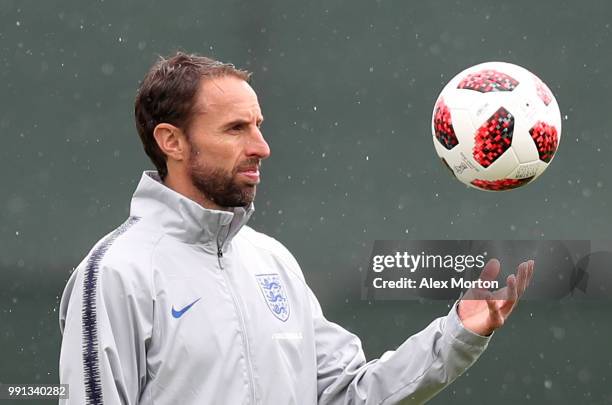 England manager, Gareth Southgate juggles a ball during an England training session on July 4, 2018 in Saint Petersburg, Russia.