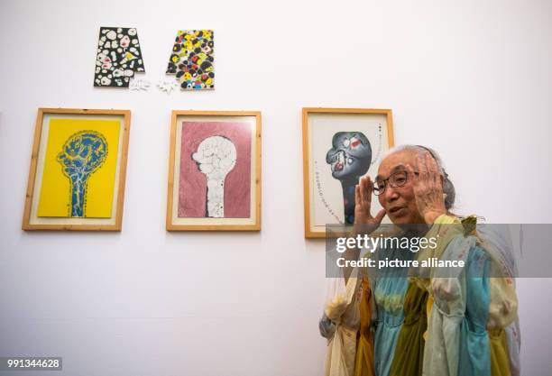 The Japanese Fluxus-artist Takako Saito, who is currently living in Duesseldorf, stands in front of her work during a press review. Her exposition...