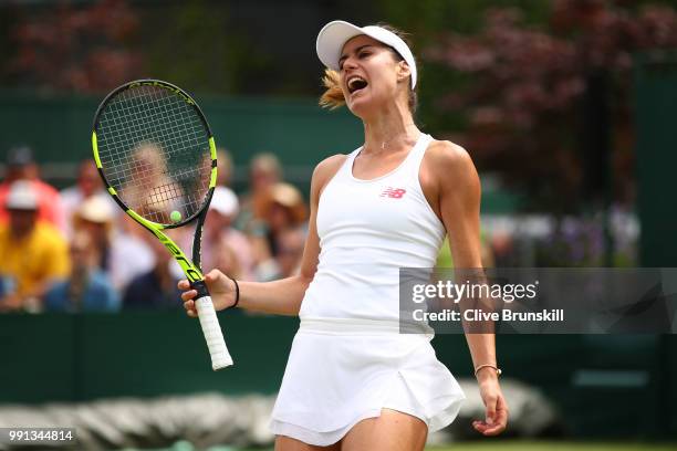 Sorana Cirstea of Romania reacts during her Ladies' Singles second round match against Evgeniya Rodina of Russia on day three of the Wimbledon Lawn...