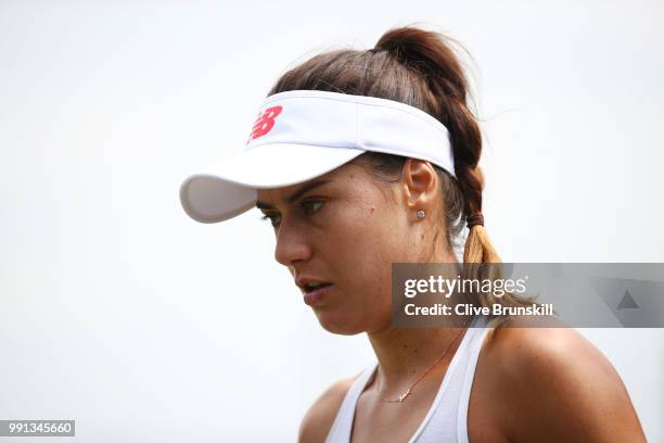 Sorana Cirstea of Romania looks on during her Ladies' Singles second round match against Evgeniya Rodina of Russia on day three of the Wimbledon Lawn...