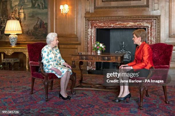 Queen Elizabeth II talks to Scotland's First Minister, Nicola Sturgeon, during an audience at the Palace of Holyrood House in Edinburgh.