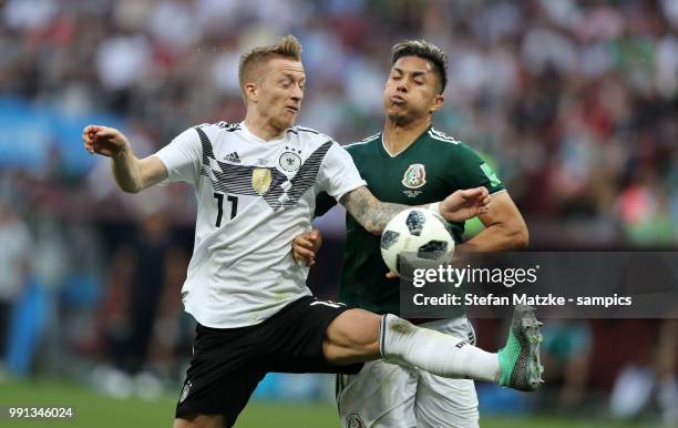 Marco Reus of Germany Carlos Salcedo of Mexico during the 2018 FIFA World Cup Russia group F match between Germany and Mexico at Luzhniki Stadium on...