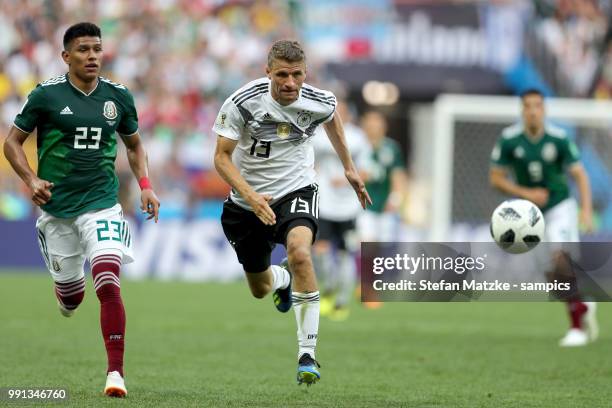 Thomas Mueller of Germany Jesus Gallardo of Mexico during the 2018 FIFA World Cup Russia group F match between Germany and Mexico at Luzhniki Stadium...