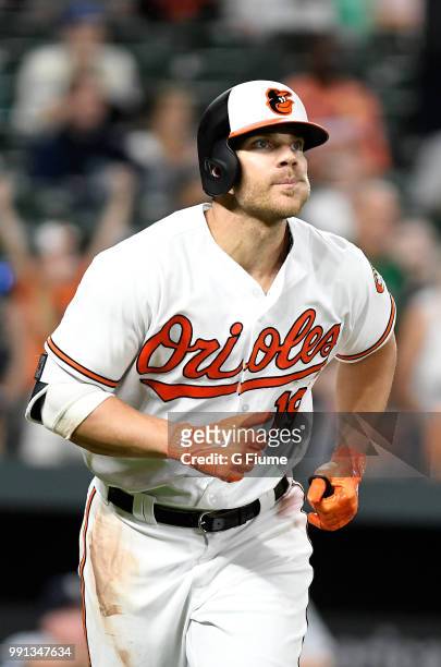 Chris Davis of the Baltimore Orioles rounds the bases after hitting a home run against the Seattle Mariners at Oriole Park at Camden Yards on June...