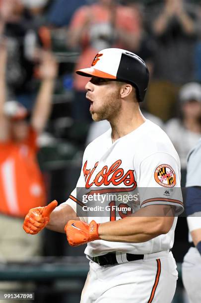 Chris Davis of the Baltimore Orioles celebrates after hitting a home run against the Seattle Mariners at Oriole Park at Camden Yards on June 27, 2018...