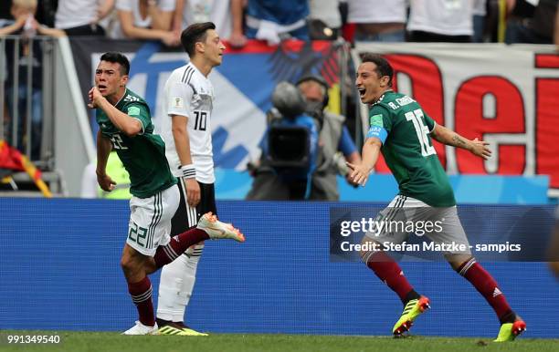 Hirving Lozano of Mexico celebrates as he scores the goal 0:1 Hector Herrera of Mexico Mesut Oezil of Germany during the 2018 FIFA World Cup Russia...