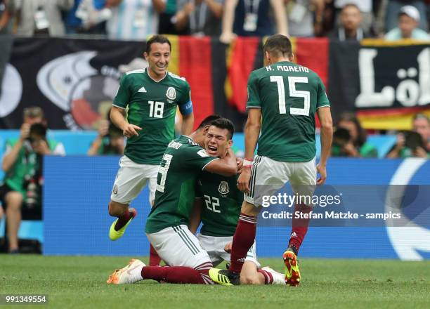 Hirving Lozano of Mexico celebrates as he scores the goal 0:1 during the 2018 FIFA World Cup Russia group F match between Germany and Mexico at...