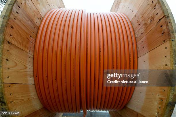 Cable drum with tubes for broadband cables stand on a construction site in Westerroenfeld, Germany, 9 November 2017. The government at that time...