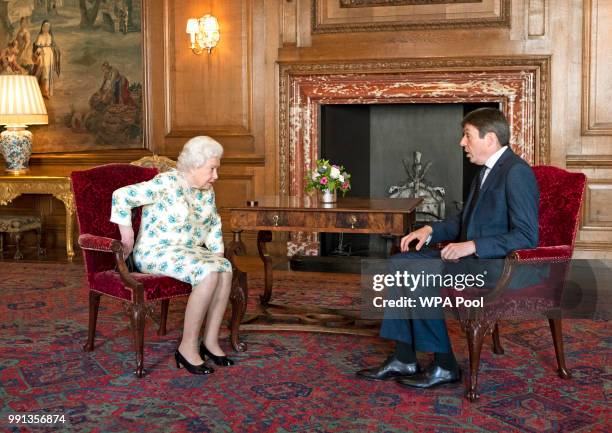 Queen Elizabeth II meets with Scottish Parliament Ken Macintosh during a private audience at the Palace of Holyrood House on July 4, 2018 in...