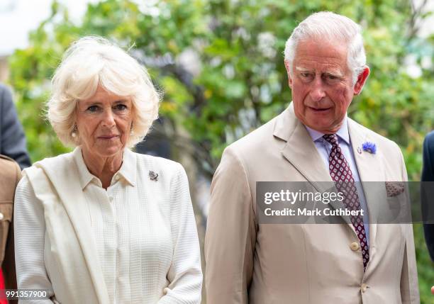 Camilla, Duchess of Cornwall and Prince Charles, Prince of Wales during a visit to Llandovery Train Station on July 4, 2018 in Llandovery, Wales.