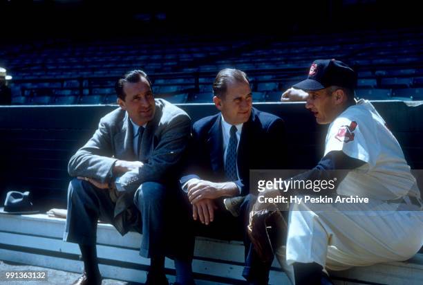 General Manager Hank Greenberg and Al Rosen of the Cleveland Indians talk with an unidentified man before an MLB game against the Chicago White Sox...