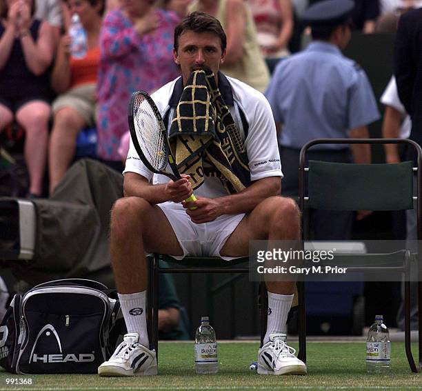 Dejected Goran Ivanisevic of Croatia after losing the third set six-love against Tim Henman of Great Britain during the men's semi finals of The All...