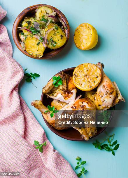 chicken a grill with a lemon - lemon chicken stock pictures, royalty-free photos & images