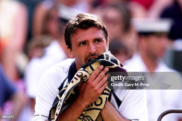 Dejected Goran Ivanisevic of Croatia after losing the third set six-love to Tim Henman of Great Britain during the men's semi finals of The All...