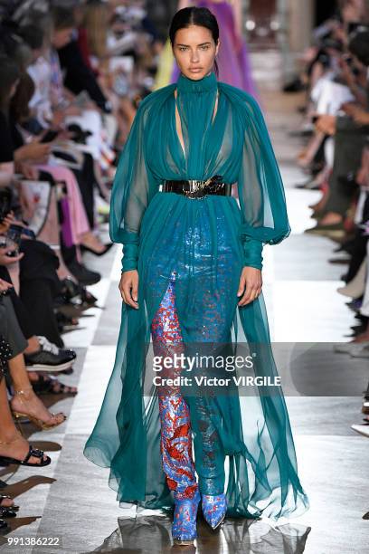 Adriana Lima walks the runway during the Schiaparelli Haute Couture Fall Winter 2018/2019 fashion show as part of Paris Fashion Week on July 2, 2018...