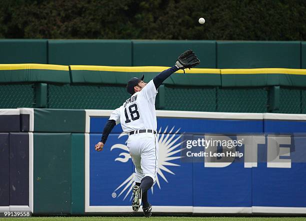 Johnny Damon of the Detroit Tigers catches a line drive off the bat of Derek Jeter of the New York Yankees in the fifth inning against the New York...