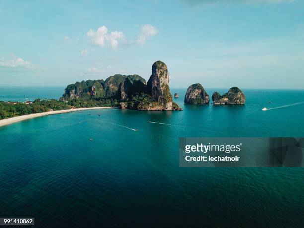 cliffs by the railay beach, krabi province, thailand - thailand stock pictures, royalty-free photos & images