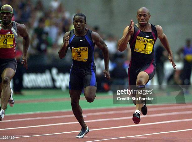 Maurice Greene of the USA wins the Mens 100 metres from Tim Montgomery of the USA and Patrick Jarrett of Jamaica during the Golden League Athletics...