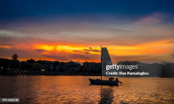 golden hour in otranto - otranto foto e immagini stock