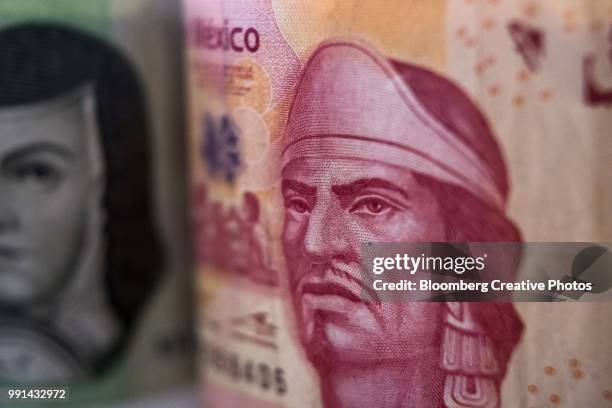 a mexican 100 peso banknote depicting the image of poet nezahualcoyotl - mexico nezahualcoyotl stock-fotos und bilder