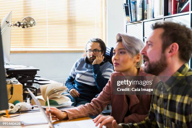 creative business people meeting in office - vanguardians stock pictures, royalty-free photos & images