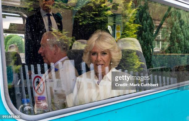 Prince Charles, Prince of Wales and Camilla, Duchess of Cornwall on the train to take them to their next engagement at Llandovery Train Station on...