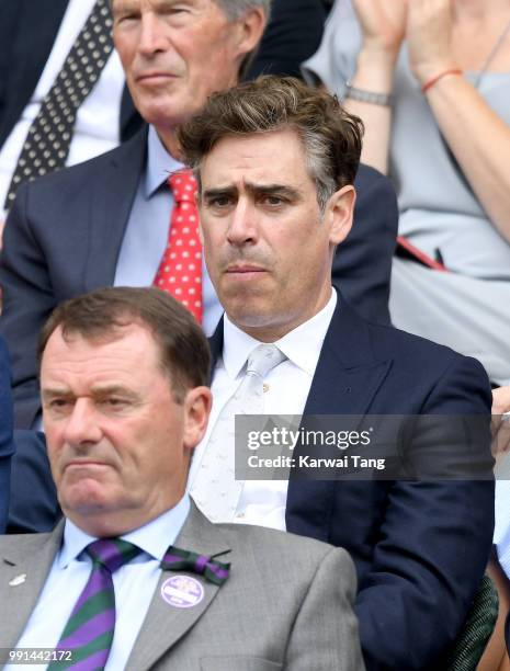 Stephen Mangan sits in the royal box on day three of the Wimbledon Tennis Championships at the All England Lawn Tennis and Croquet Club on July 4,...