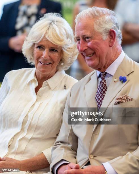 Prince Charles, Prince of Wales and Camilla, Duchess of Cornwall watch a performance at The Strand Hall on July 4, 2018 in Builth Wells, Wales.