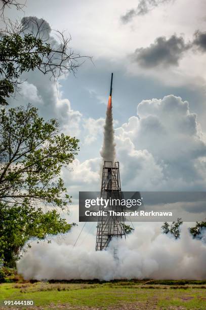 bamboo rocket lunching into the sky - lunching stock pictures, royalty-free photos & images