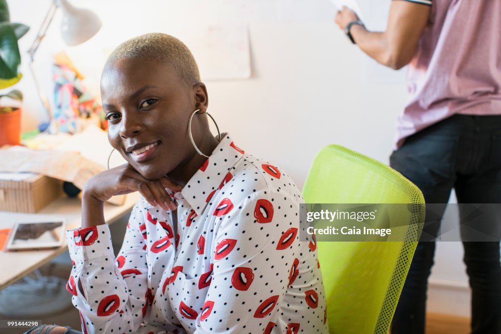 Portrait smiling, confident creative businesswoman