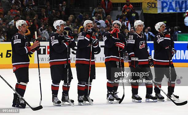 The team of USA looks dejected after the IIHF World Championship group A match between Finland and USA at Lanxess Arena on May 12, 2010 in Cologne,...