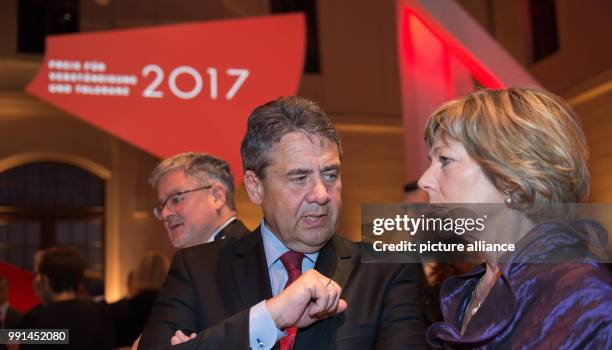 Foreign minister and laudator Sigmar Gabriel from The Social Democratic Party of Germany , the partner of former German president and award winner...