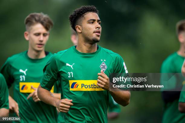 Keanan Bennetts runs during a training session of Borussia Moenchengladbach at Borussia-Park on July 04, 2018 in Moenchengladbach, Germany.