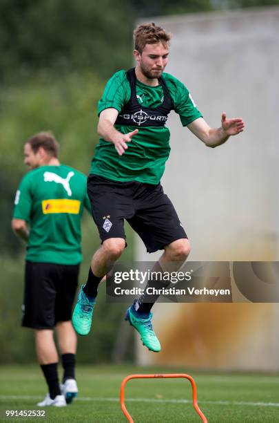 Christoph Kramer jumps during a training session of Borussia Moenchengladbach at Borussia-Park on July 04, 2018 in Moenchengladbach, Germany.