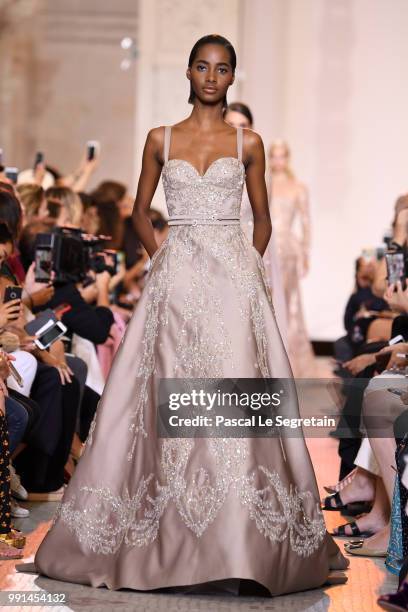 Model walks the runway during the Elie Saab Haute Couture Fall Winter 2018/2019 show as part of Paris Fashion Week on July 4, 2018 in Paris, France.