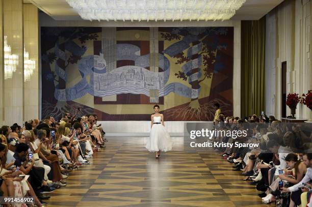 Model walks the runway during the Ulyana Sergeenko Haute Couture Fall Winter 2018/2019 show as part of Paris Fashion Week on July 3, 2018 in Paris,...