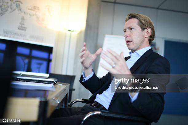 Chairman of the Ravensburg Group Clemens Maier talks in his office in the headquarters of the company in Ravensburg, Germany, 6 November 2017. Photo:...