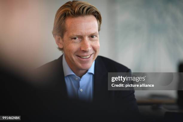 Chairman of the Ravensburg Group Clemens Maier talks in his office in the headquarters of the company in Ravensburg, Germany, 6 November 2017. Photo:...