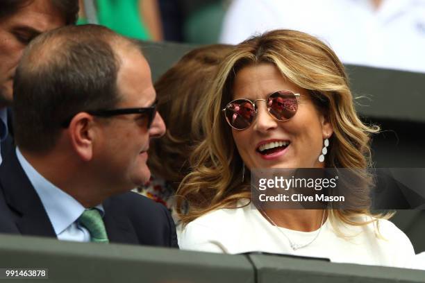 Mirka Federer, wife of Roger Federer of Switzerland, smiles from the stands prior to her husband's Men's Singles second round match against Lukas...