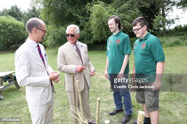Prince Charles, Prince of Wales speaks to people as he celebrates the 60th Anniversary of the designation of the Brecon Beacons National Park at the...