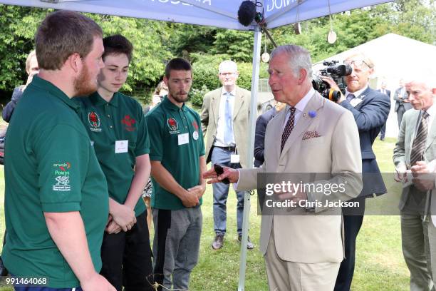 Prince Charles, Prince of Wales speaks to people as he celebrates the 60th Anniversary of the designation of the Brecon Beacons National Park at the...