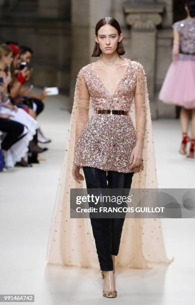 Model presents a creation by Galia Lahav at the end of the 2018-2019 Fall/Winter Haute Couture collection fashion show in Paris, on July 4, 2018.