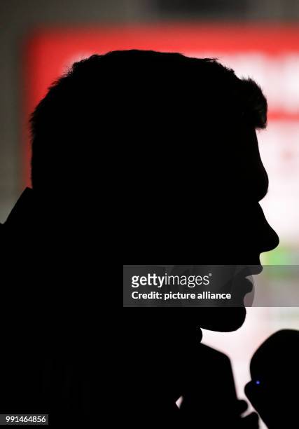 Germany's Matthias Ginter speaks to media prior to a training session for the German national football team ahead of their match friendly match...
