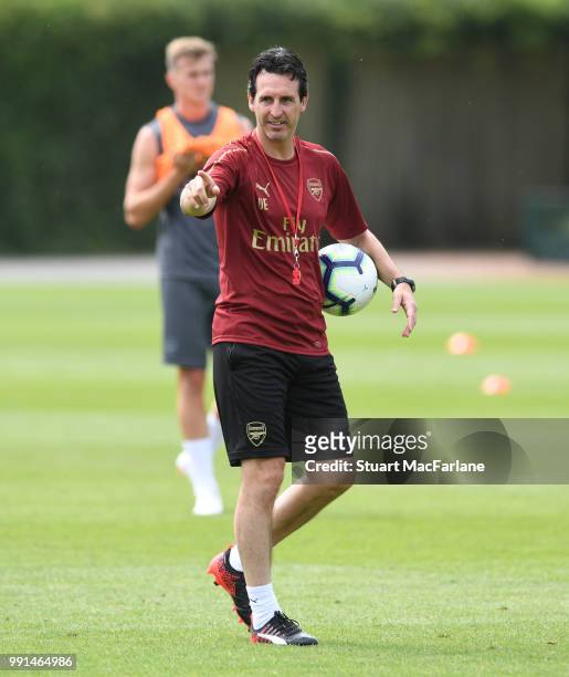 Arsenal Head Coach Unai Emery gestures during a training session at London Colney on July 4, 2018 in St Albans, England.